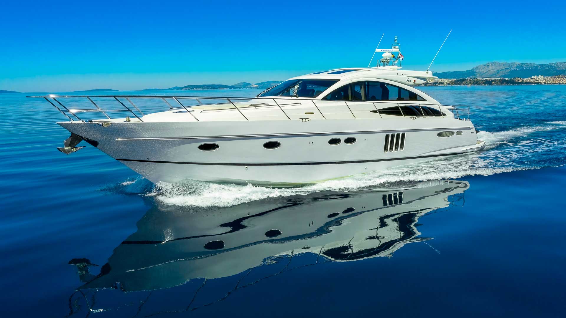 Luxury yacht cruising calm Mediterranean waters